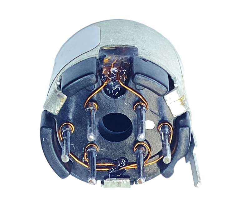 Pot Core Transformer mounted on Tag Plate (Through Hole Pins) and assembled with Spring and Can